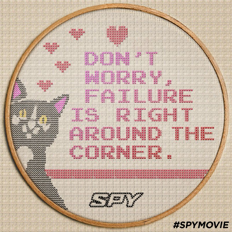 Cross-stitch of a cat with the text Don't worry, failure is right around the corner, and the #SPYMOVIE logo